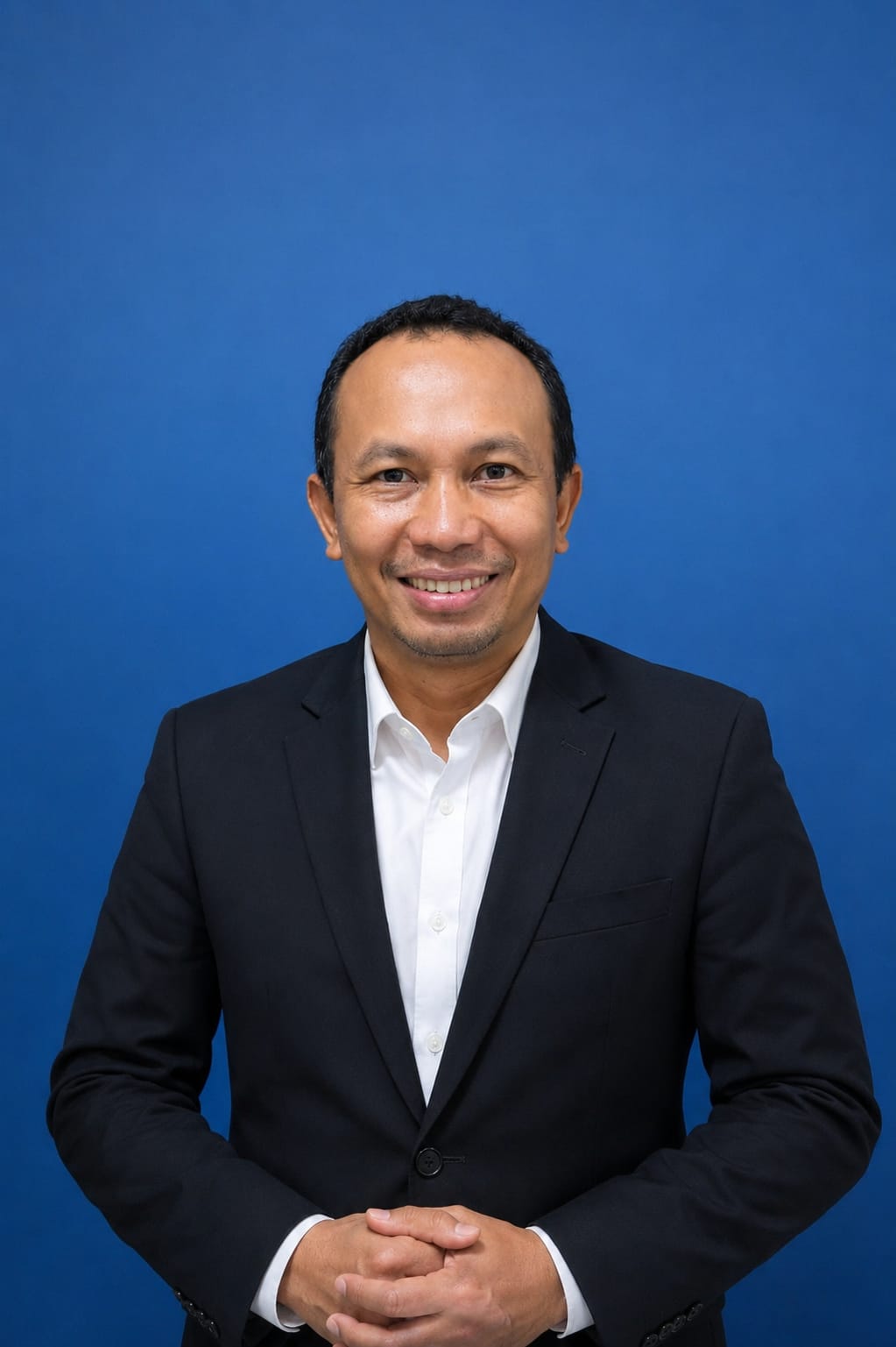 Iman Kadarusman, M.Pi